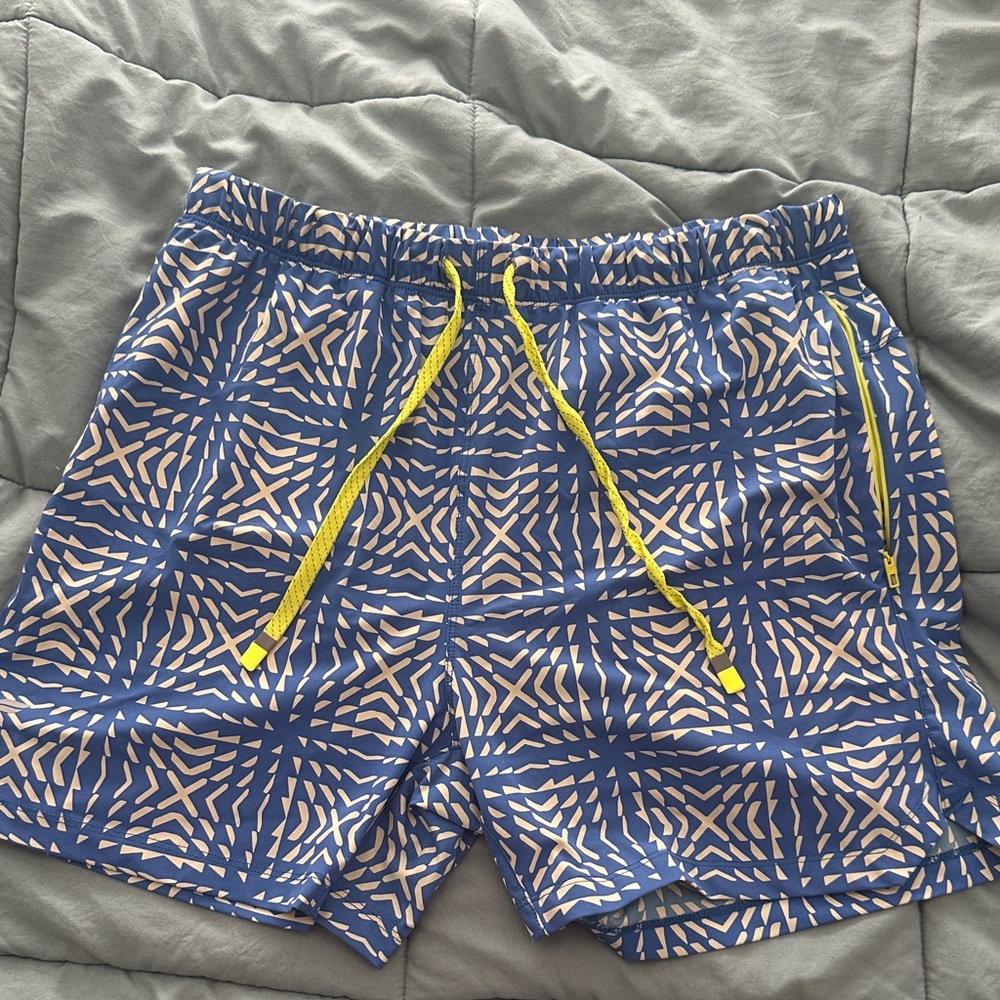 Fabletics Blue and White Patterned Swim Trunks with Yellow Accents